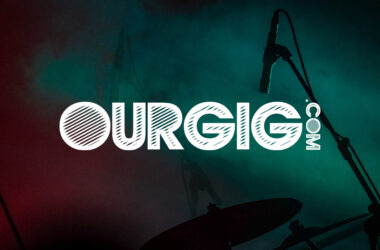 ourgig.com logo over photo if a stage